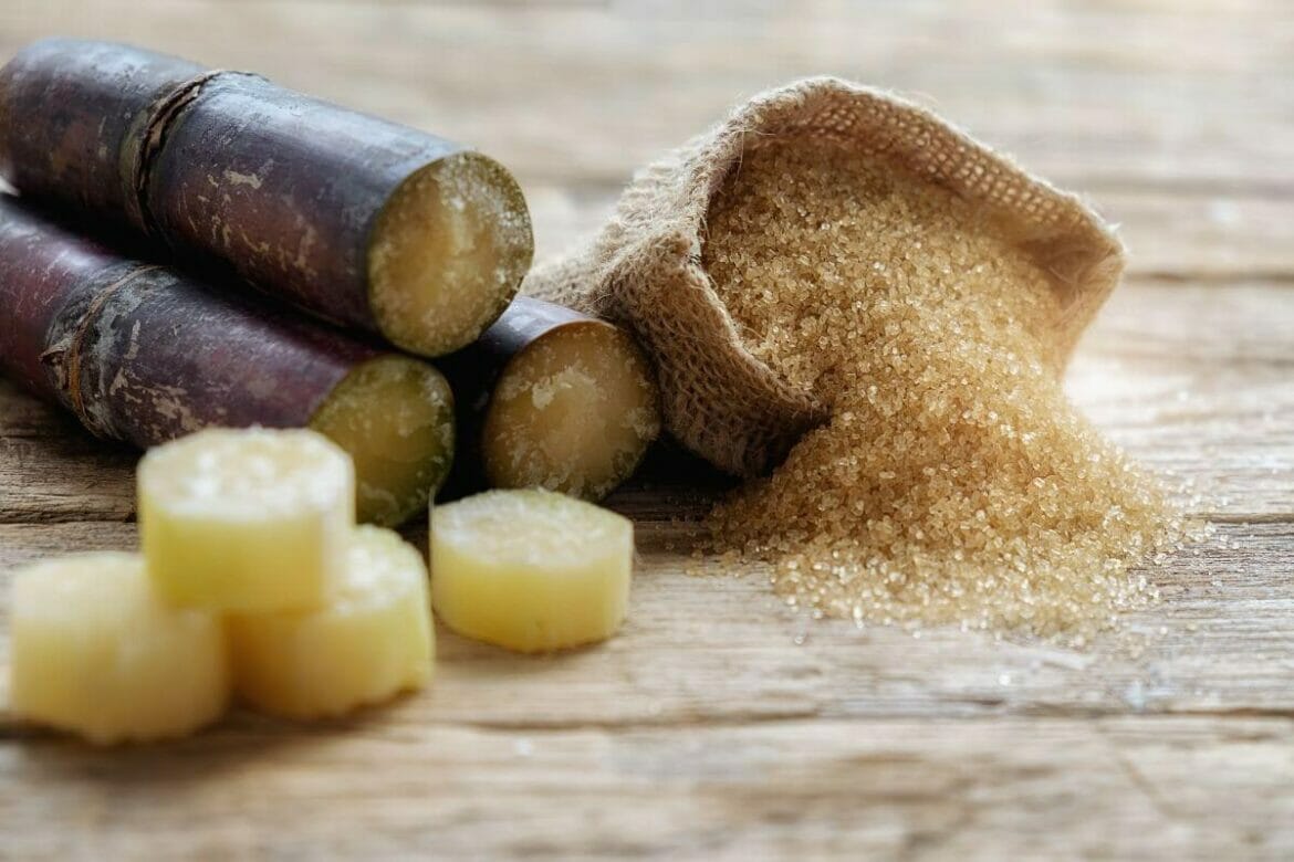 Images of Sugarcane cut into pieces, and brown sugar