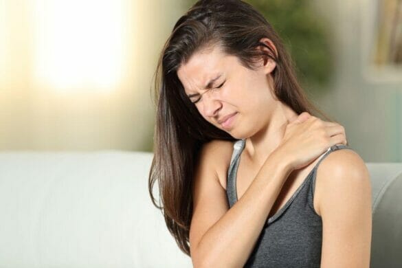 Woman suffering from pain due to Fibromyalgia