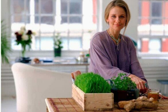 Smiling woman with home remedies ingredients