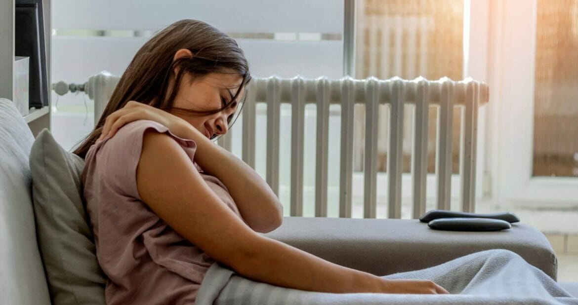 A woman with neck and shoulder pain