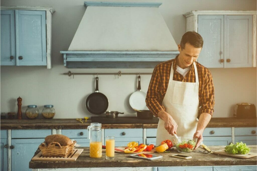 Young man cooking as a hobby