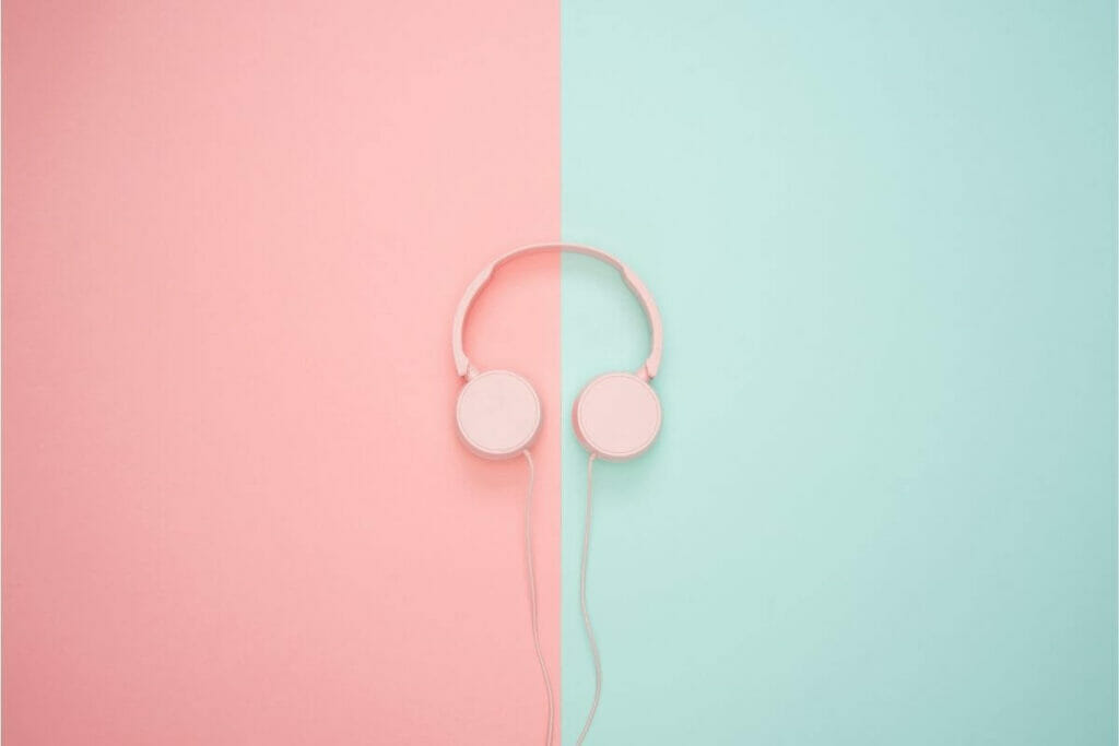 Image of a headphone in a pink and blue background