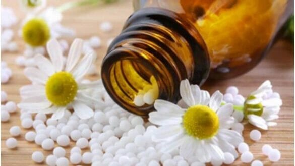 Image of a bottle with homeopathy medicines