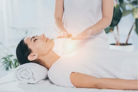 Reiki practitioner healing patient