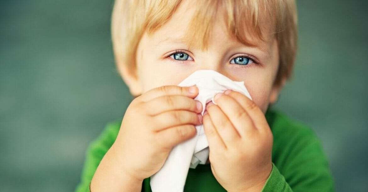Image of a toddler with runny nose