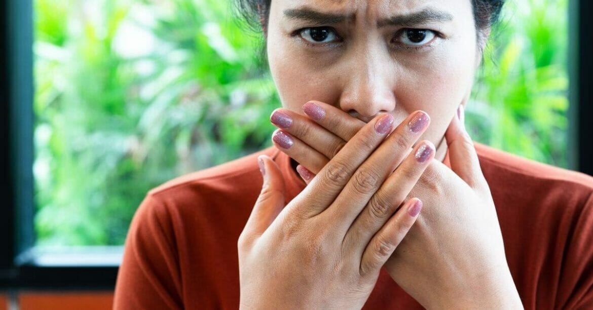 Image of a woman suffering from bad breath