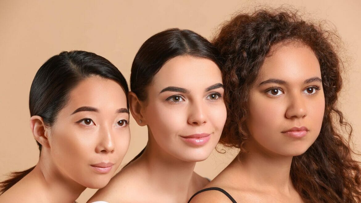 Image of three young, healthy women with beautiful skin