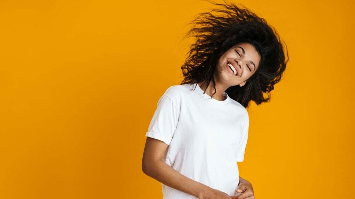 Smiling young woman with healthy hair