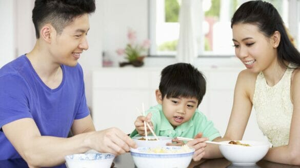 Image of a family eating a meal at home