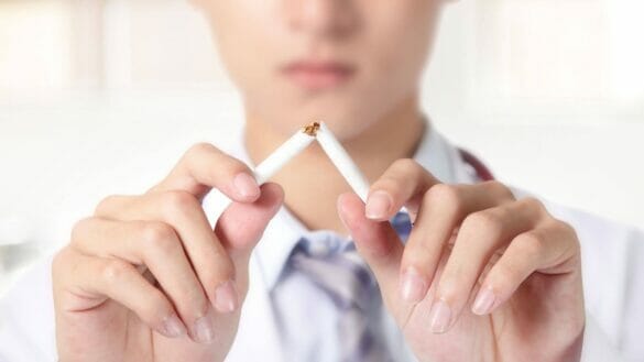 Young man with a desire to quit smoking