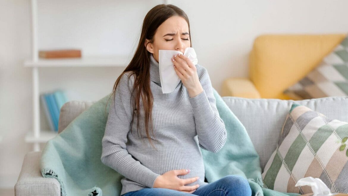 Image of a woman with dry cough during pregnancy
