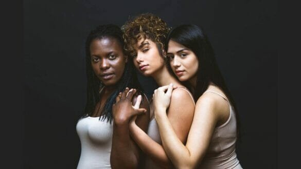 Image of three young women with beautiful skin