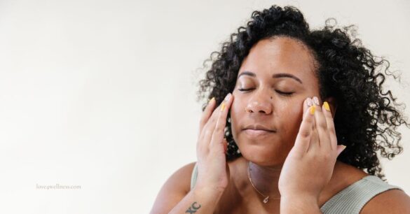 Image of a woman practising menopause skincare routine
