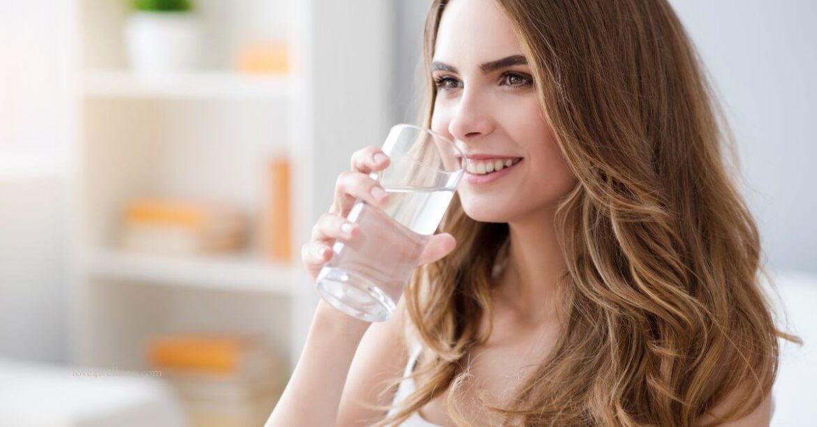 Image of a woman drinking water post meal - is it good or bad
