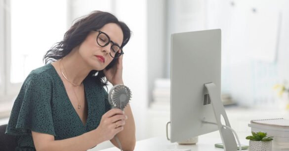 Image of a woman suffering from hot flashes - home remedies can help with vasomotor symptoms (hot flashes and night sweats)