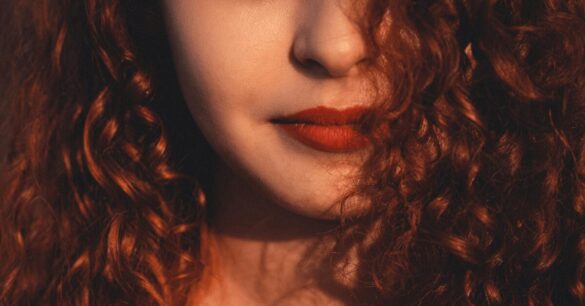 Woman with henna-indigo treated hair to cover gray