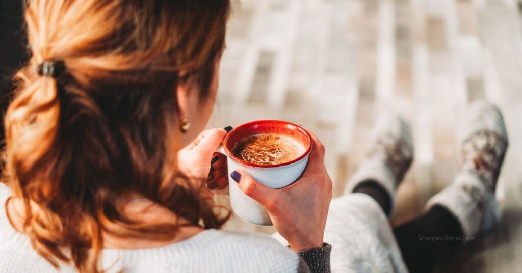 Woman holding a coffee cup