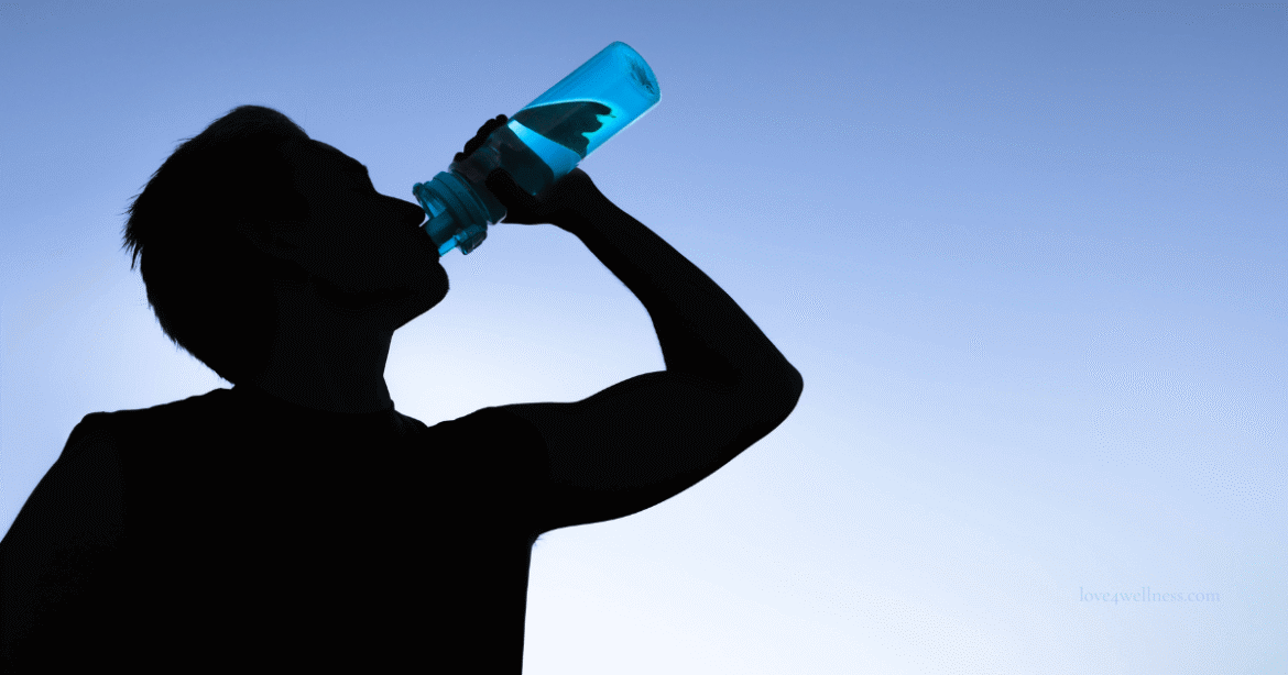 Hydration is important for visceral fat loss - Image showing a man drinking water