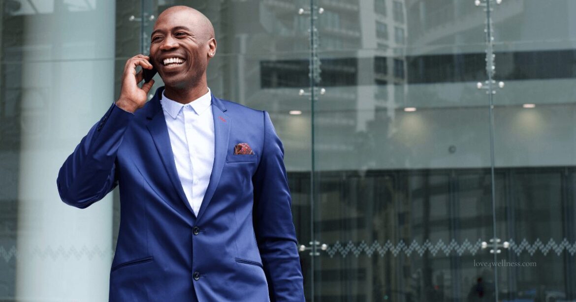 Image of a man talking on phone and walking