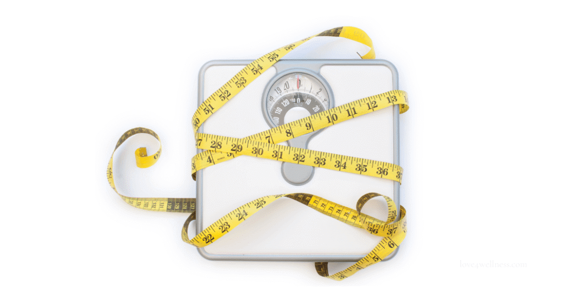 Image of a weighing scale and measuring tape: Which is the best metric to measure visceral fat loss?