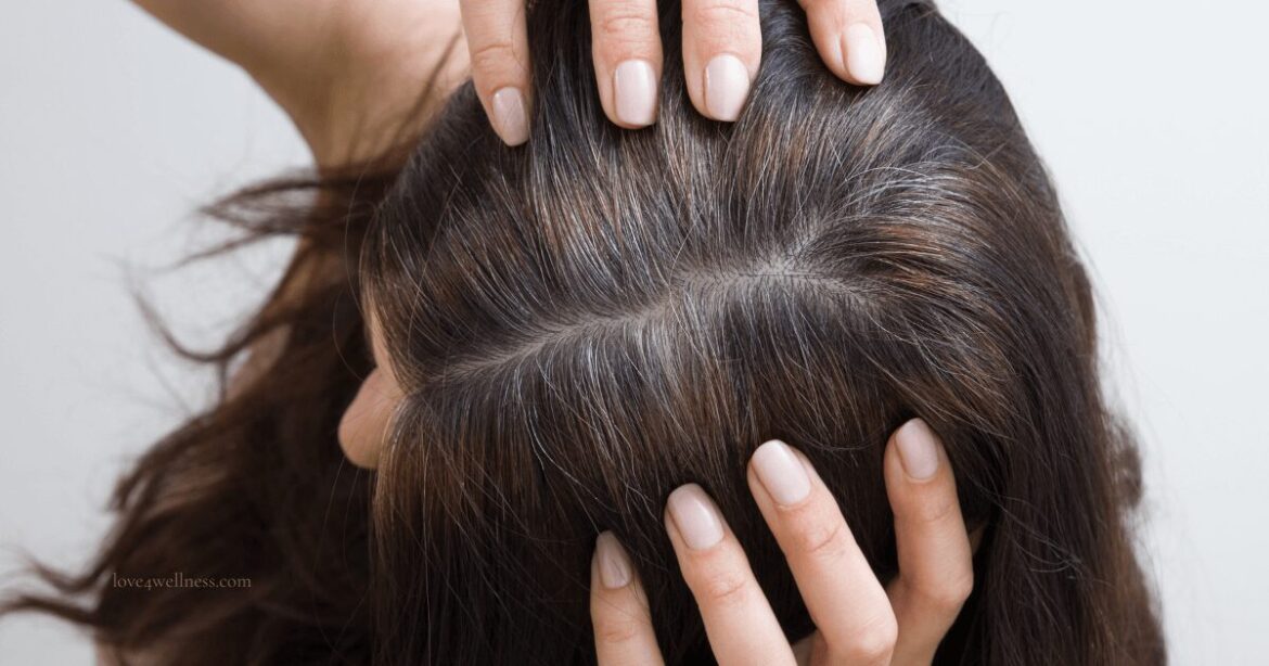 Image of a woman showing stubborn grey hair