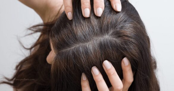 Image of a woman showing stubborn grey hair
