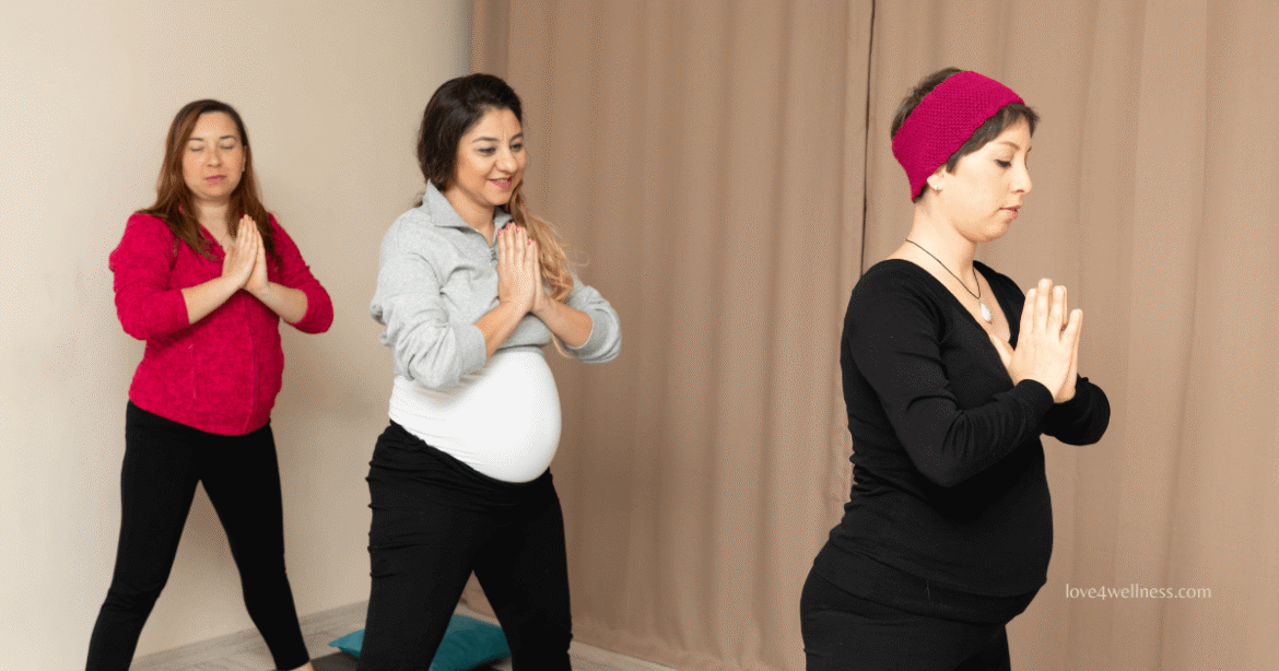 Group of expectant mothers doing Prenatal yoga